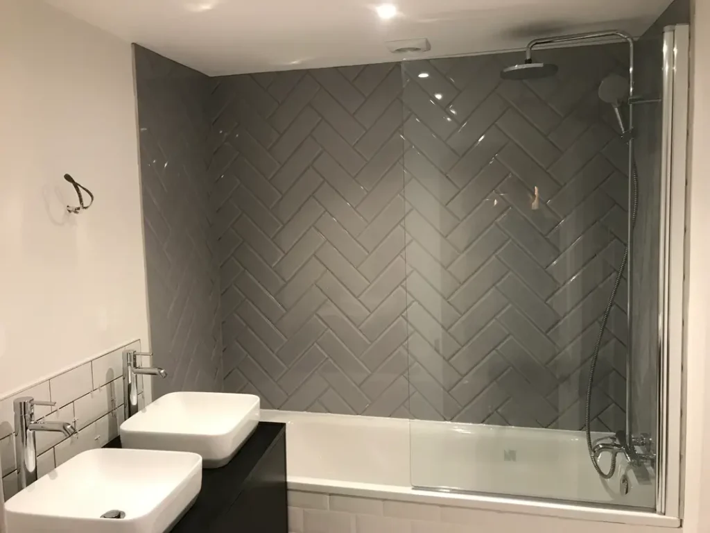 a bathroom with a shower and sink